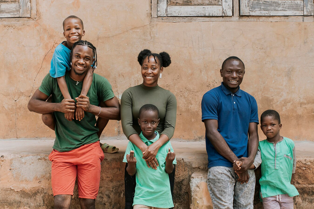 Three people with three children