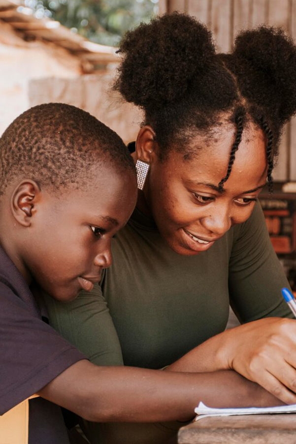 A lady teaching a child